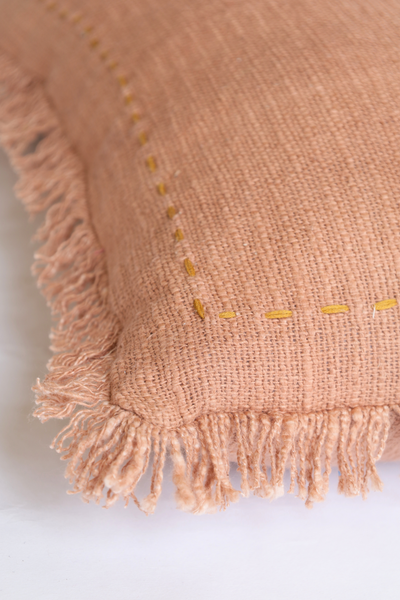 Sun baked textured cushion