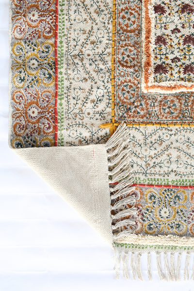 UNERATHERD BLOCK PRINTED RUG