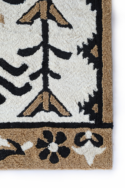 Snowflake floral tufted rug