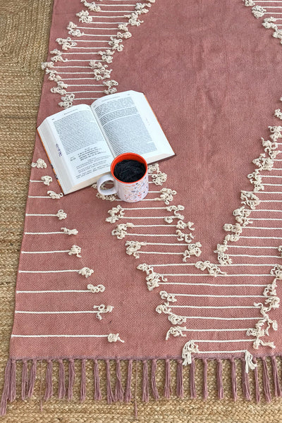 DIMENSIONAL EMBROIDERED RUG